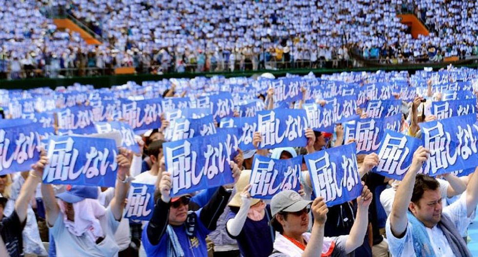 Thousands rally against US military base on Japan's Okinawa