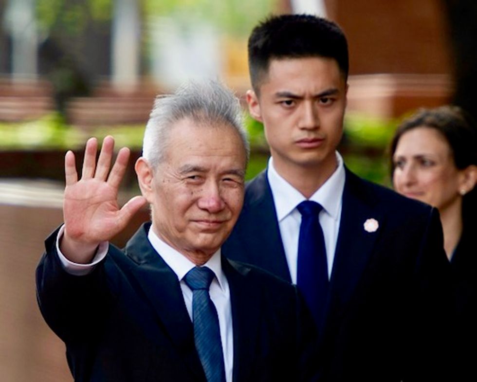 US hits China with higher tariffs, raising stakes in trade talks