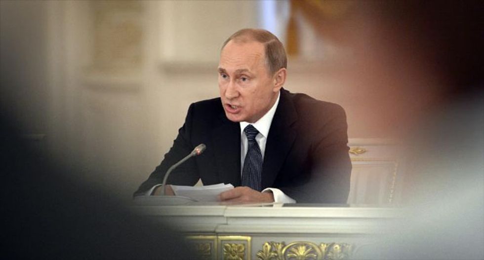 Putin enacts law banning 'undesirable' NGOs