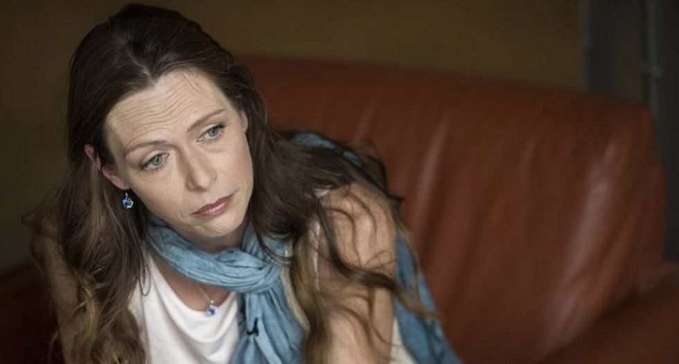 Kansas woman faces prison and loses son after he tells classmates medical marijuana saved mom’s life