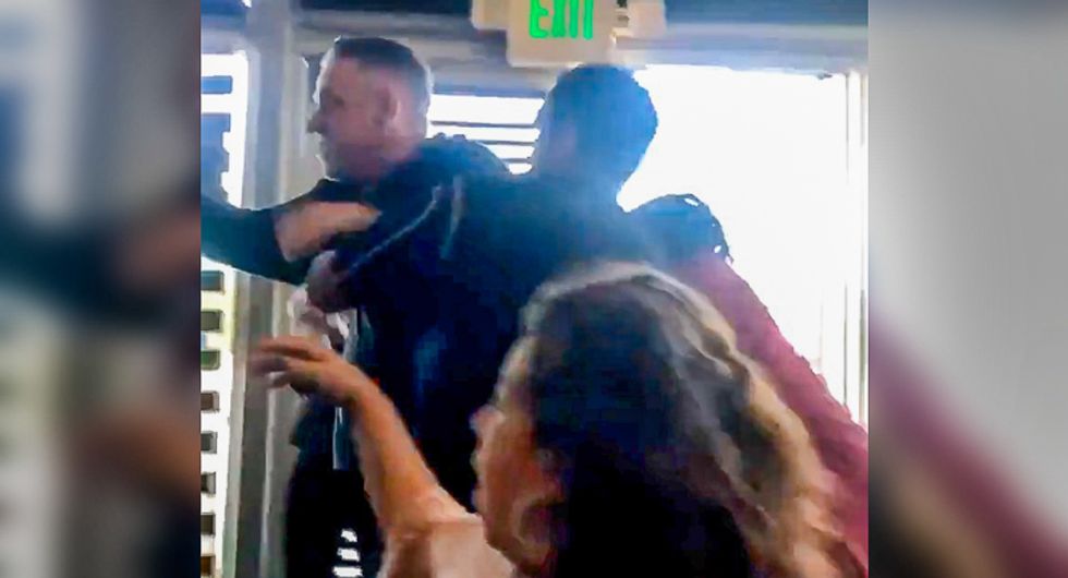 WATCH: Hell breaks loose at restaurant after impatient white customer calls black patron 'monkey man'
