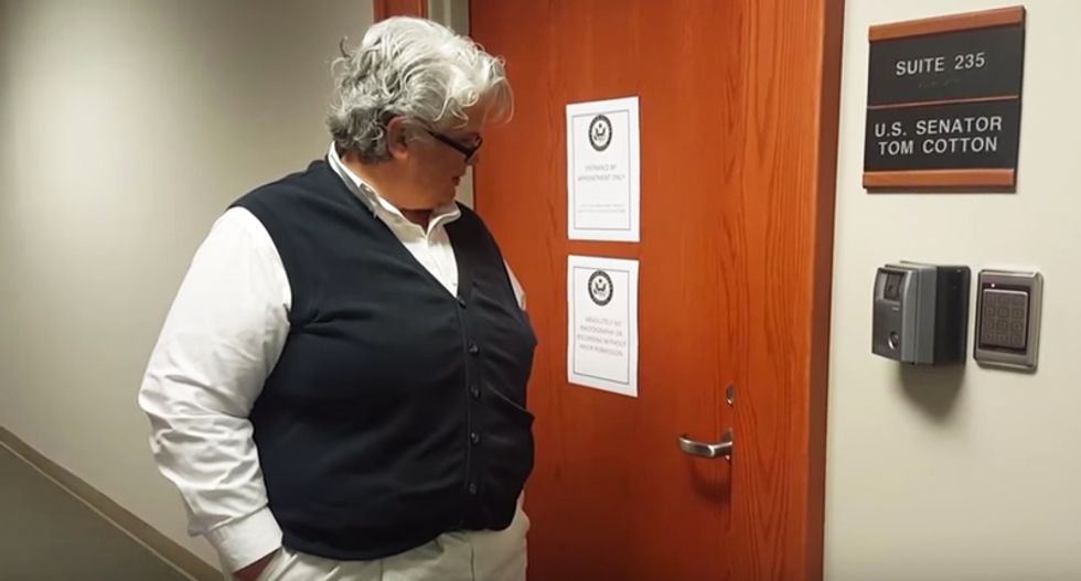 WATCH: Tom Cotton's staffers cower behind door as constituents seek answers on Obamacare