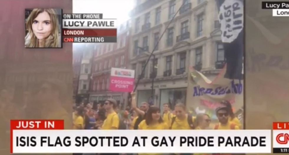 Man trolls ISIS at LGBT pride event with fake penis flag — and CNN thinks it's real