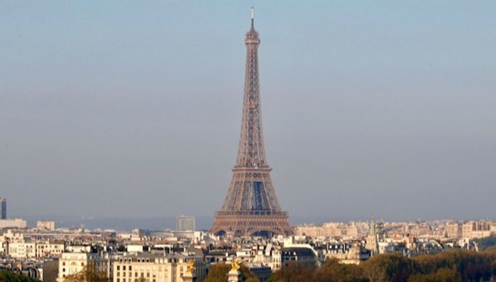 Eiffel Tower evacuated as climber attempts to scale iconic monument