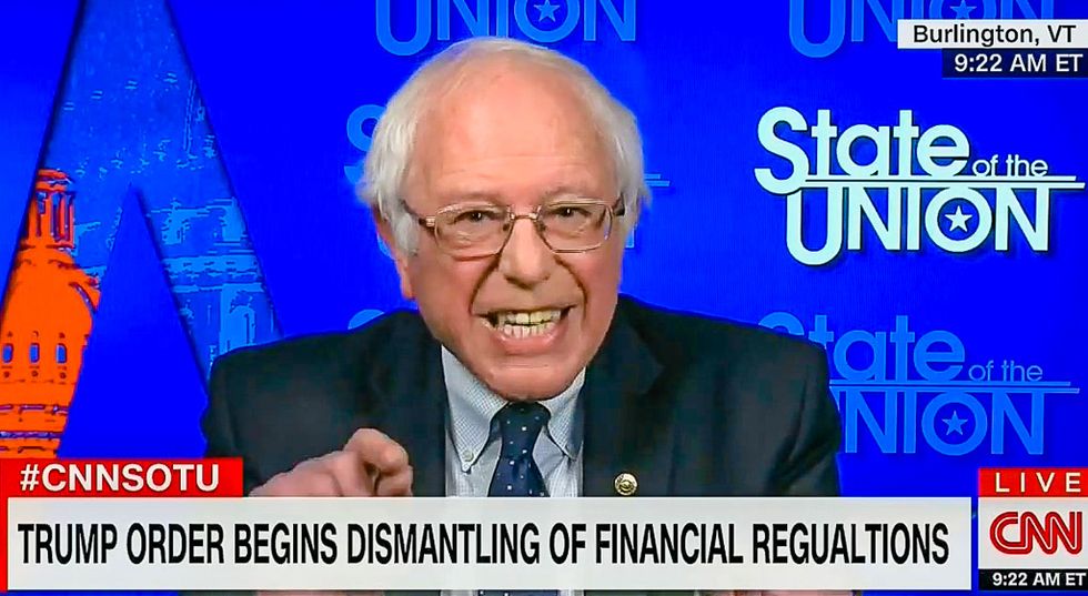 'This guy is a fraud': Bernie Sanders blasts Trump for selling out voters to help Wall Street