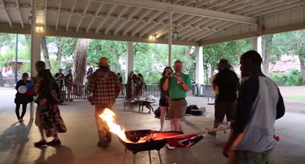Black Lives Matter activist hit with arson charges in Colorado for burning the Confederate flag
