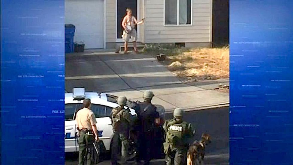 Naked, banjo-playing Washington man taken into custody after two-hour standoff with police