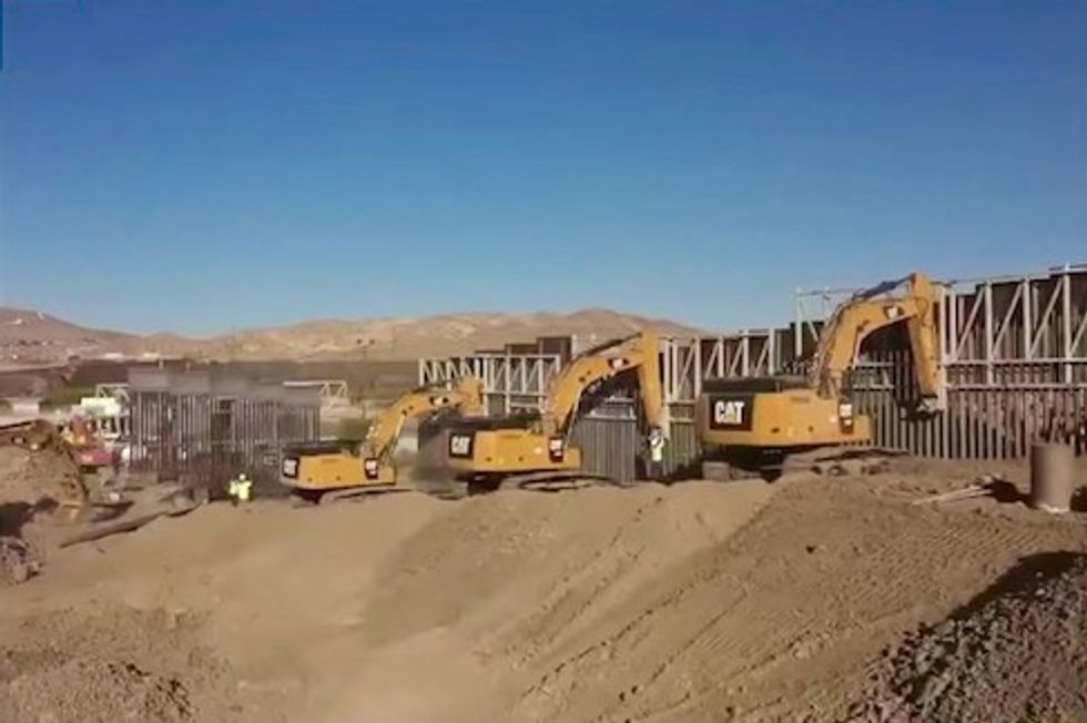 Private group backed by Trump supporters builds border barrier in El Paso