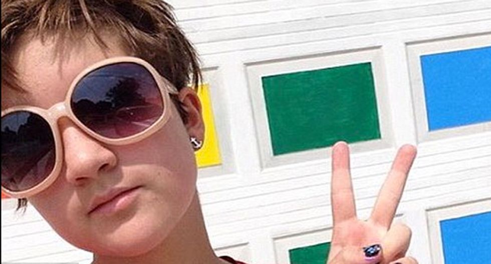 New Jersey mother of bisexual teens responds to 'I'm gay' graffiti vandals in a colorful and awesome way