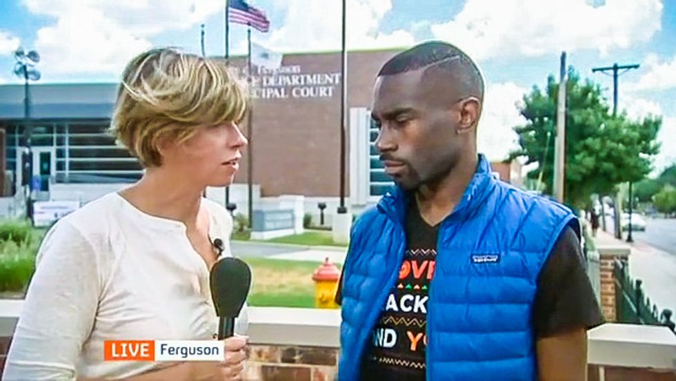 WATCH: British reporter in Ferguson finds whites openly carrying rifles and peaceful blacks being arrested