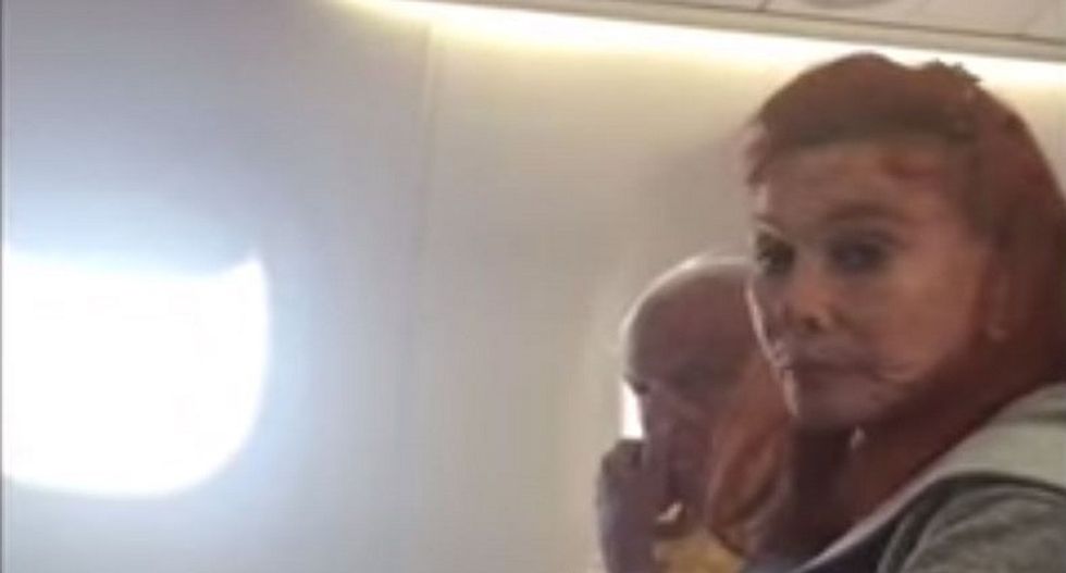 WATCH: Woman on plane has screaming meltdown after being asked to leave with her belligerent dog