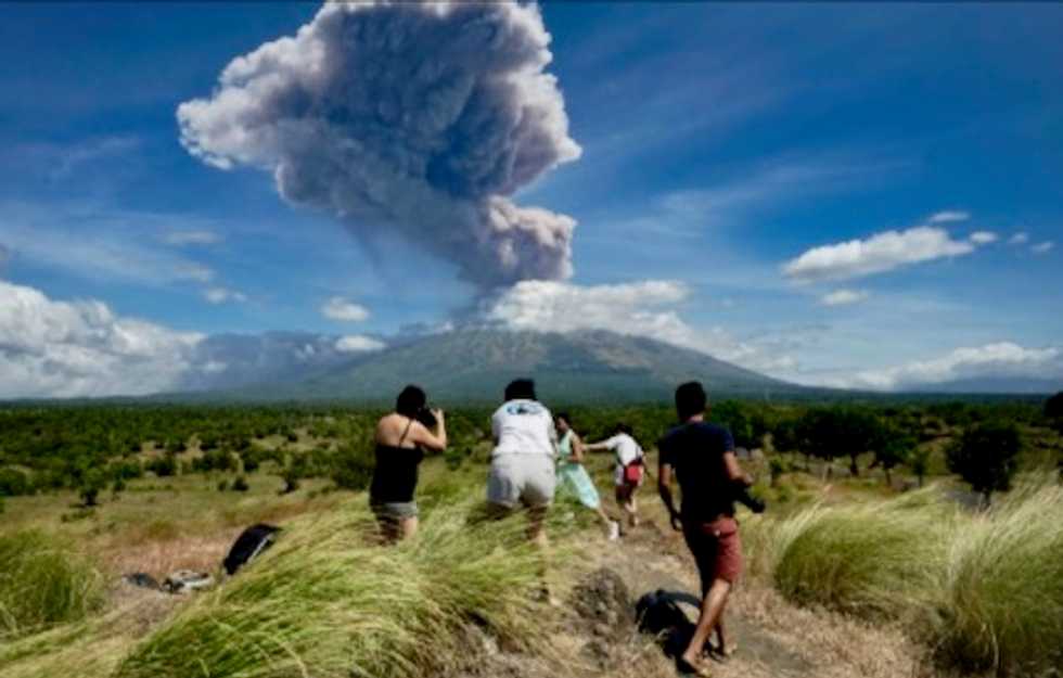 Bali volcano spews ash in new eruption