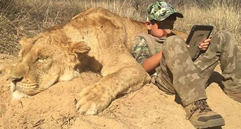 Photo of 7-year-old son killing his ‘first lion’ yanked from Twitter by proud dad after activists shame him