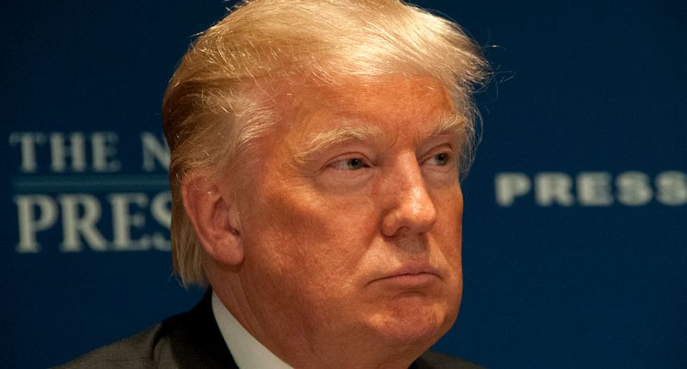 Trump tweeted Obama wiretap claims after aide slipped a Breitbart article into his reading pile: report