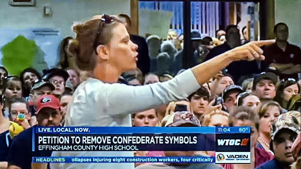 WATCH: White school board crowd boos NAACP, call blacks 'racist' over objection to 'Dixie' fight song