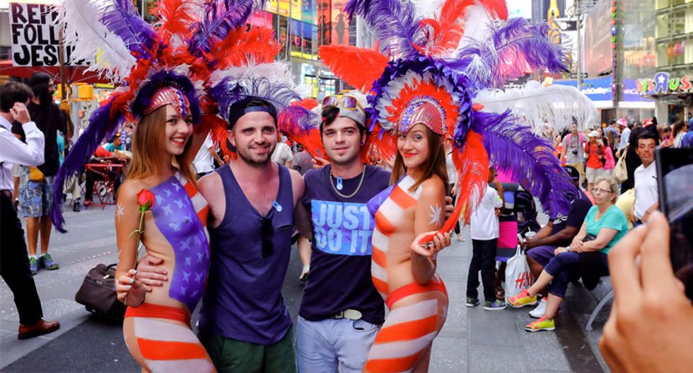 New York governor joins calls for Times Square crackdown on topless women