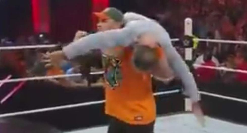 WATCH: Jon Stewart gets slammed during WWE appearance
