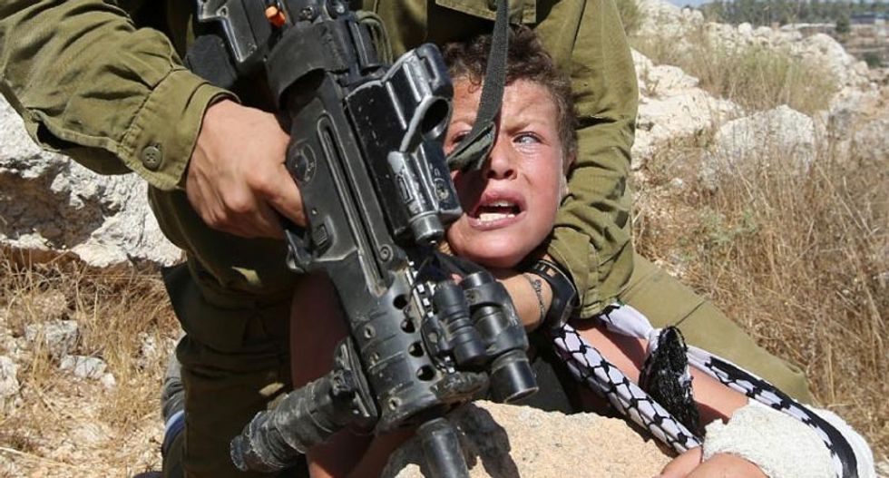 Video of Israeli soldier arresting boy becomes latest in war of perception