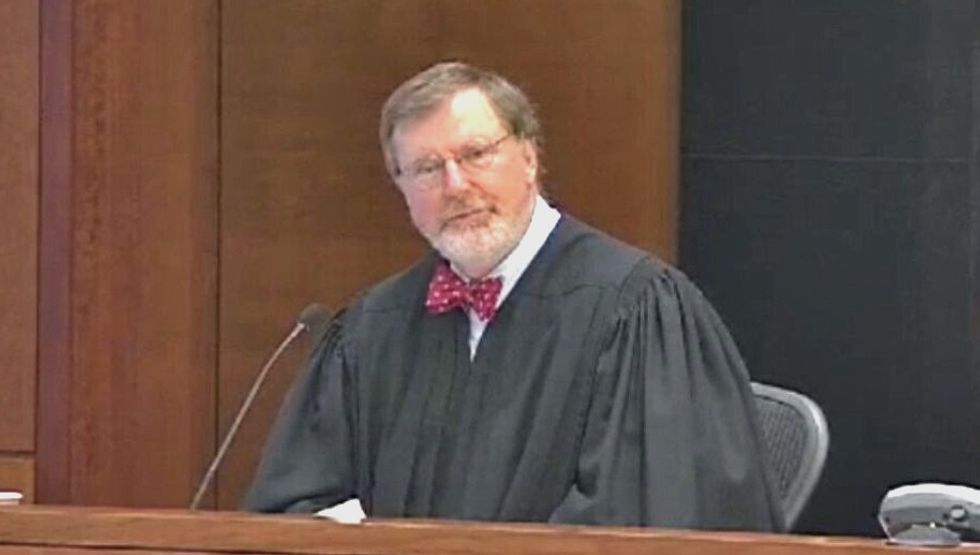 Washington state moves to block Trump's new travel ban in court