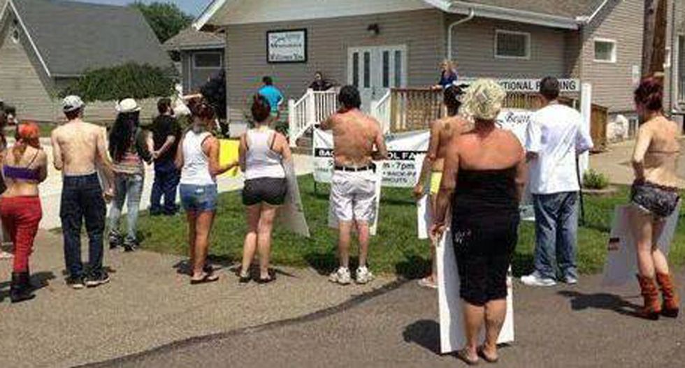 9-year-long church vs strip club war continues as pastor sues over topless protesters