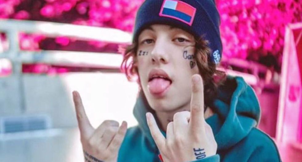 WATCH: Hip hop artist filmed pulling gun and launching racist tirade at man in late night gas station argument