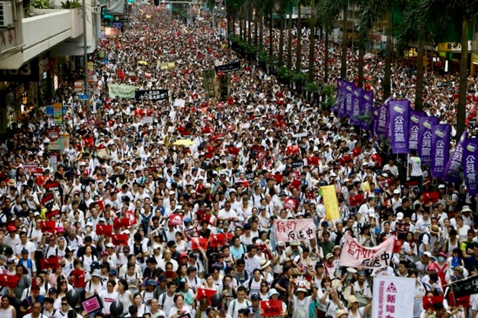 Tens of thousands march again in huge Hong Kong anti-government rally