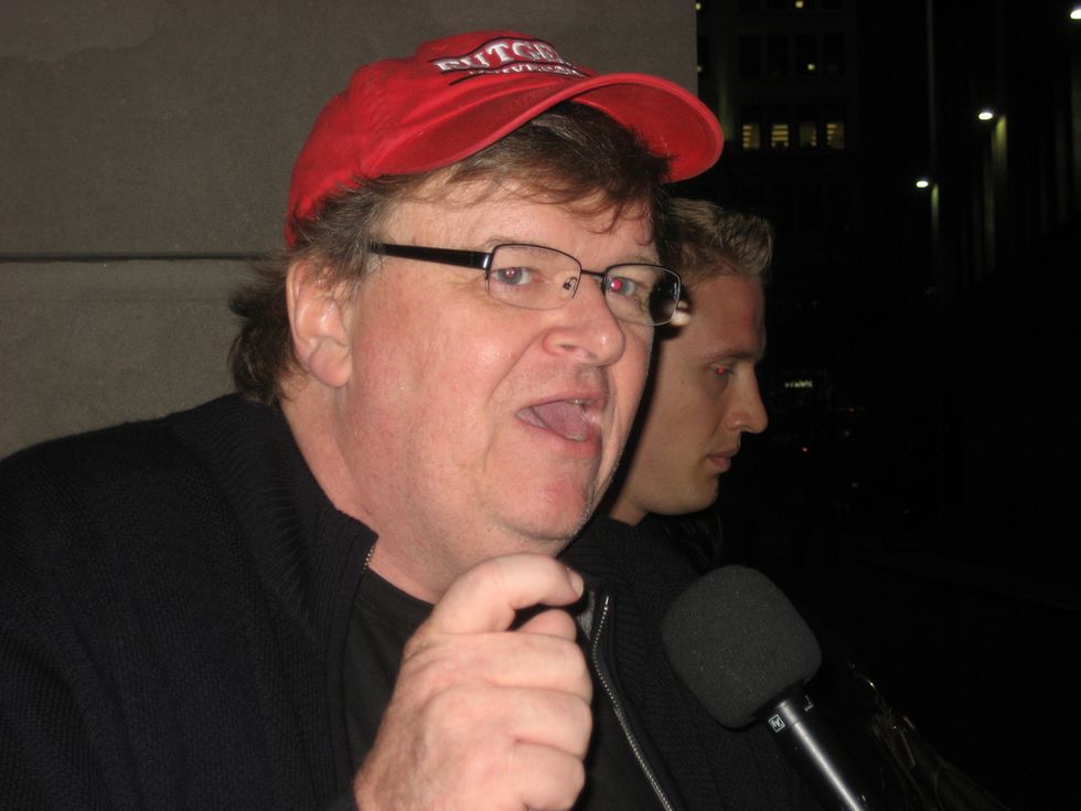 Michael Moore: We have to save Americans from Trump like you would from 'a pedophile'