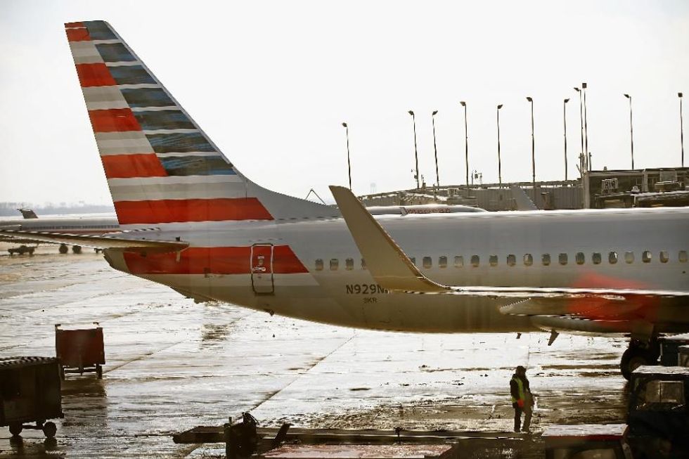 American Airlines ordered passengers to stop social distancing — because they hadn't paid for exit seats