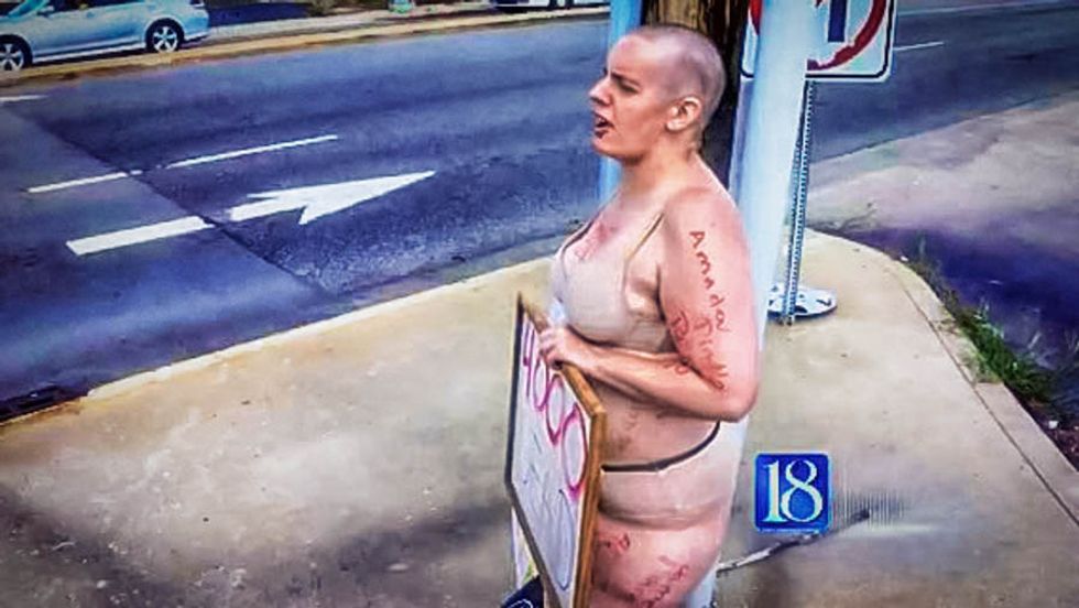 Indiana woman strips in the street to challenge Confederate flag 'appreciation' ride