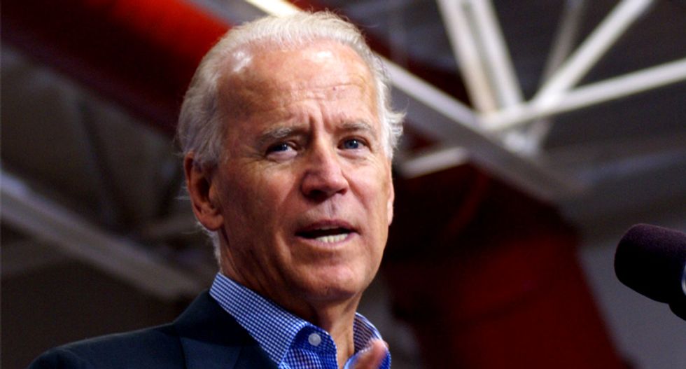 Joe Biden calms crowd when heckler interrupts his speech: 'This isn't a Trump rally -- let him go!'