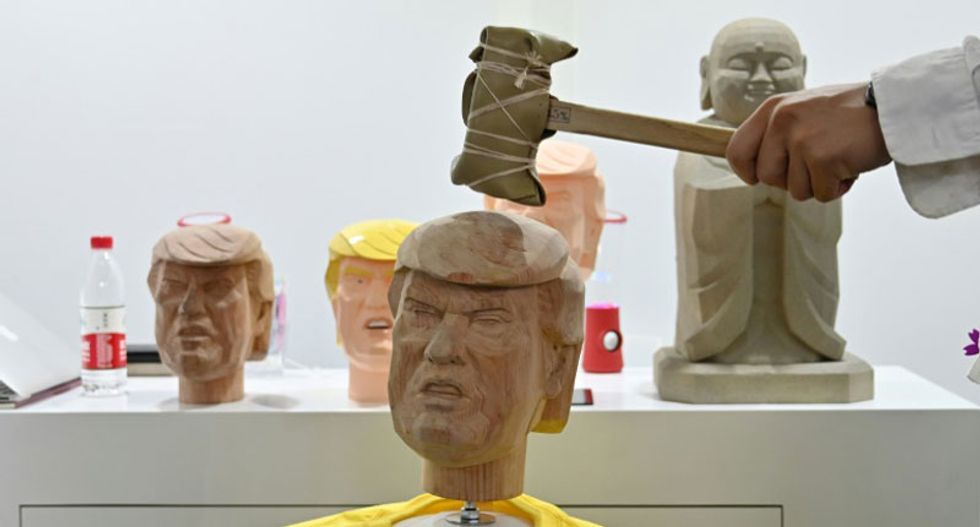 ‘Stress-relief’ station in China lets people ‘smash a life-sized bobblehead likeness’ of Trump: report
