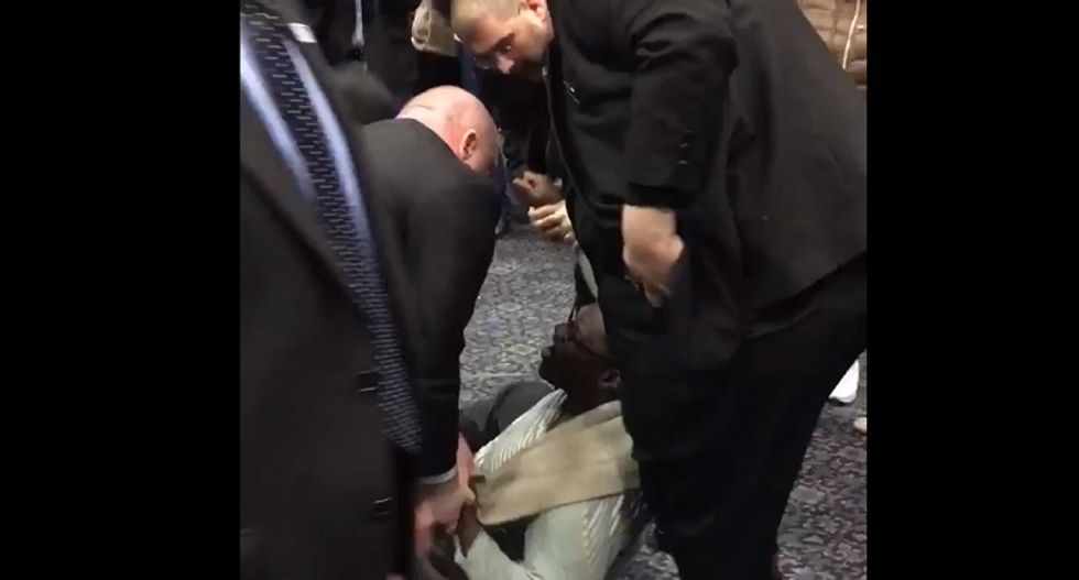 ‘Light that motherf*cker on fire!’: Vegas Trump rally off the charts as private guards toss black activist