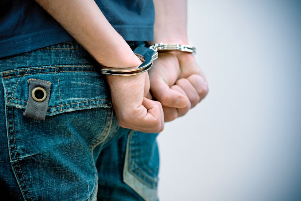 Miami cop pulled 5-year-old's ear then marched him to squad car in handcuffs after school fight over toy