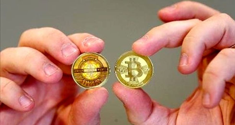 UBS boss says bitcoin 'not money', urges regulators to act