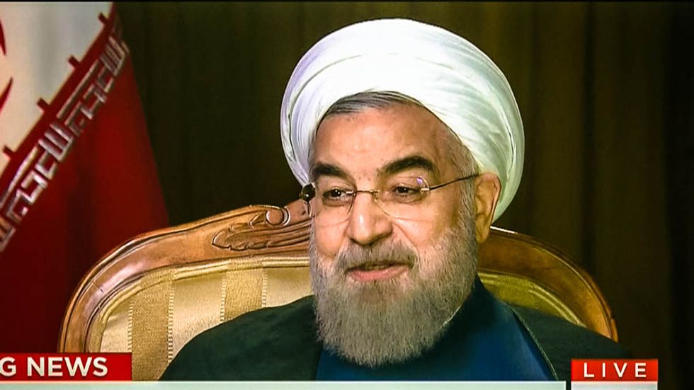 President Hassan Rouhani says Iran 'very happy' Trump leaving
