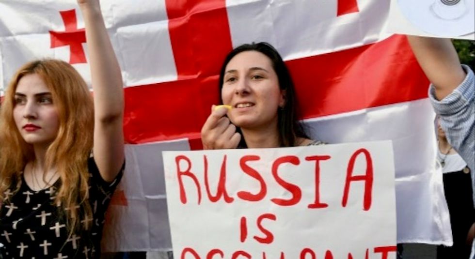 Russians hit out at Kremlin ban on flights to Georgia