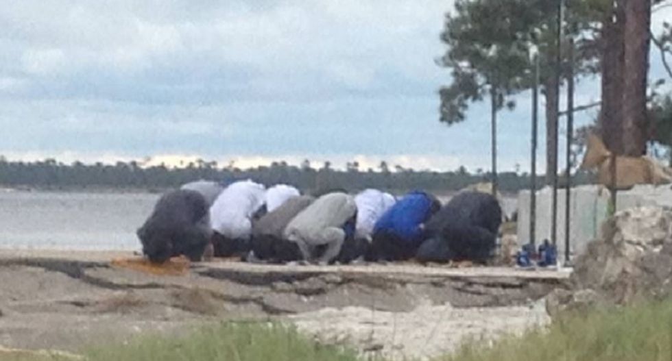 Storm of paranoia and hate erupts in Florida town after photo shows Muslims praying at beach