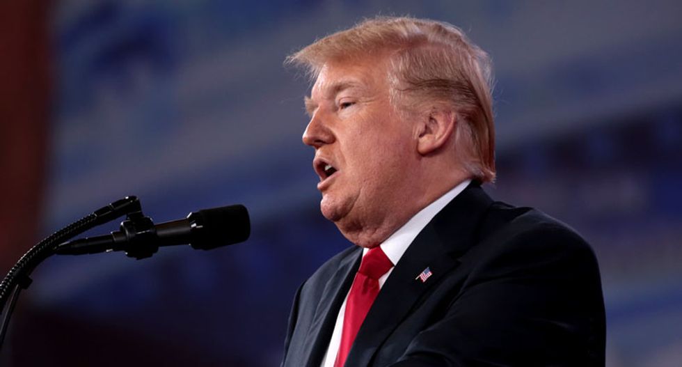 Trump trashes 'fake news liberals' in fundraising email announcing a 'deplorable' rally in Michigan