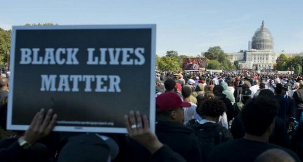 Thousands of African-Americans gather in Washington DC on the 20th anniversary of 'Million Man March'