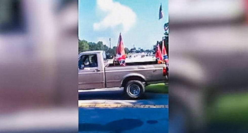 Grand jury indicts 15 on gang terrorism charges for parading Confederate flags through black child’s party