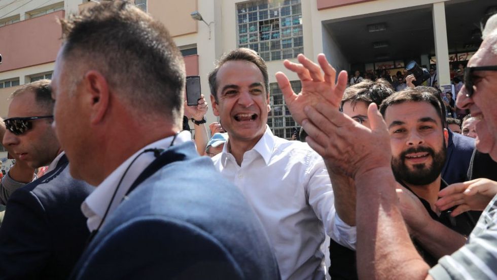 Greek conservatives return to power with decisive election win
