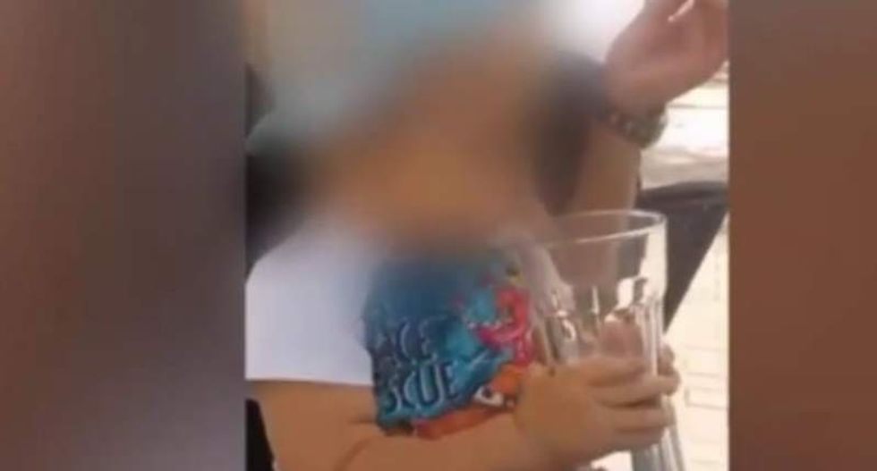 Toddler forced to smoke and drink alcohol in disturbing video posted online