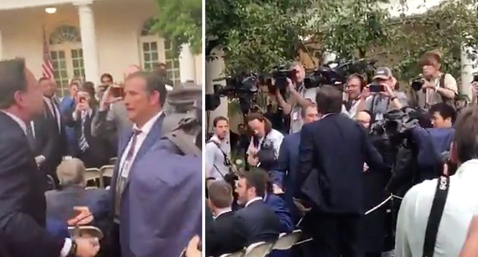 Fight breaks out with right-wing conspiracy theorists 'getting in the faces of media' after Trump presser