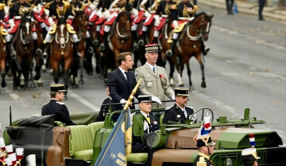 Paris clashes tarnish Macron's military parade
