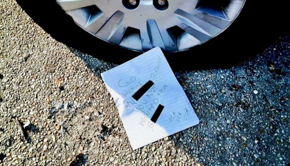 Muslim woman new in town got a flat tire - and a note, 'Go home terrorist'