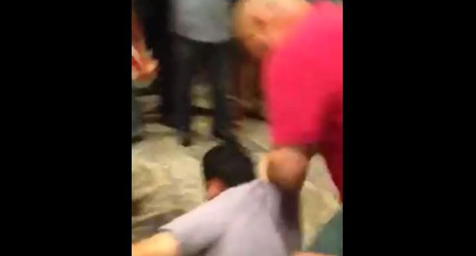 WATCH: Trump supporter assaults Latino protester while others chant 'USA! USA!'