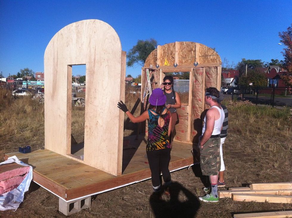 Denver police arrest 10 activists for building free housing for the homeless in public park