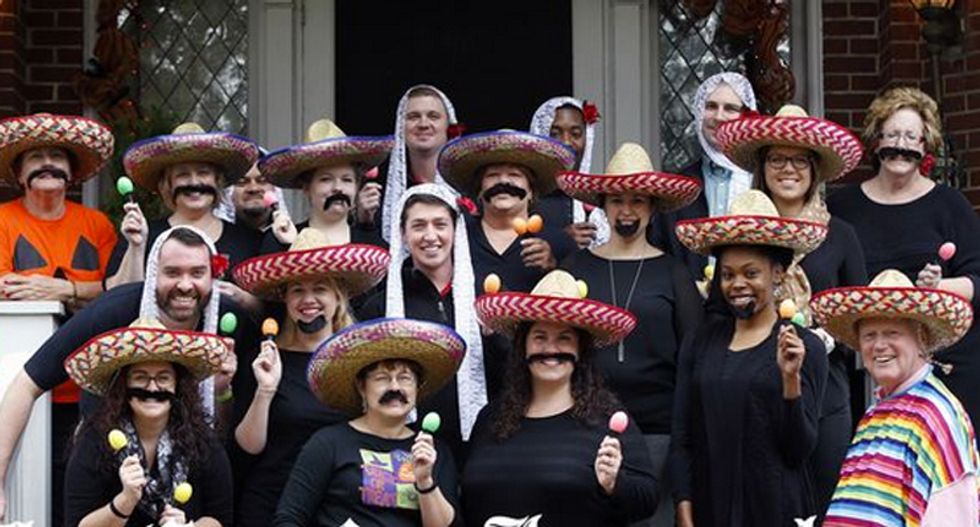 Louisville students protest after school president and staff pose in racist costumes for Halloween