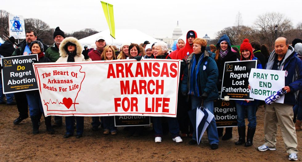 Arkansas officials send email urging state employees to attend anti-choice march led by GOP governor