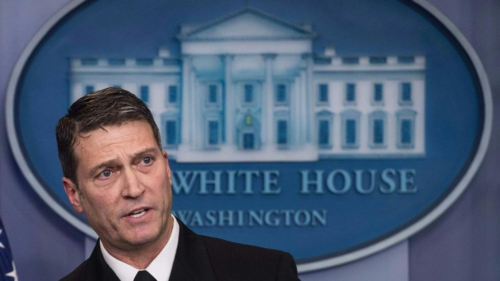 Trump's personal physician accused of drunkenly banging on a female employee's door
